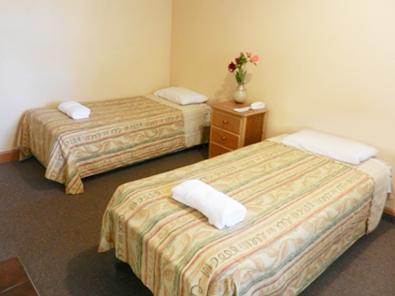 Twin room interior with all amenities